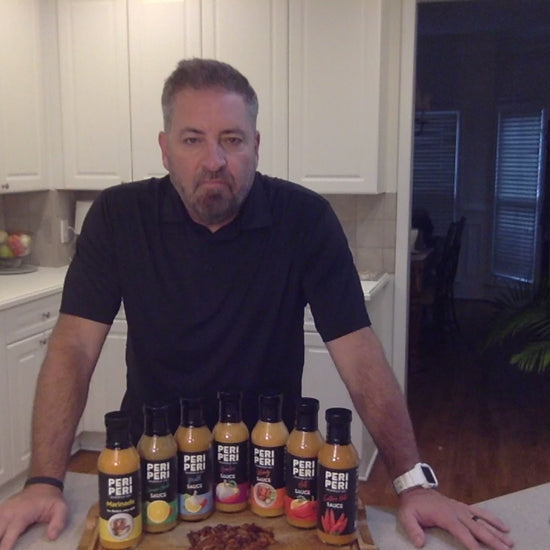 Owner, Scott Harlow, explaining the amazing flavor of Extra Hot Peri Peri sauce (his favorite)