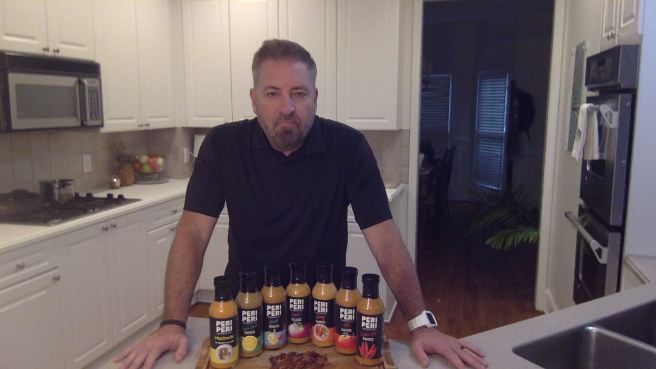 Owner, Scott Harlow, explaining the amazing flavor of Extra Hot Peri Peri sauce (his favorite)